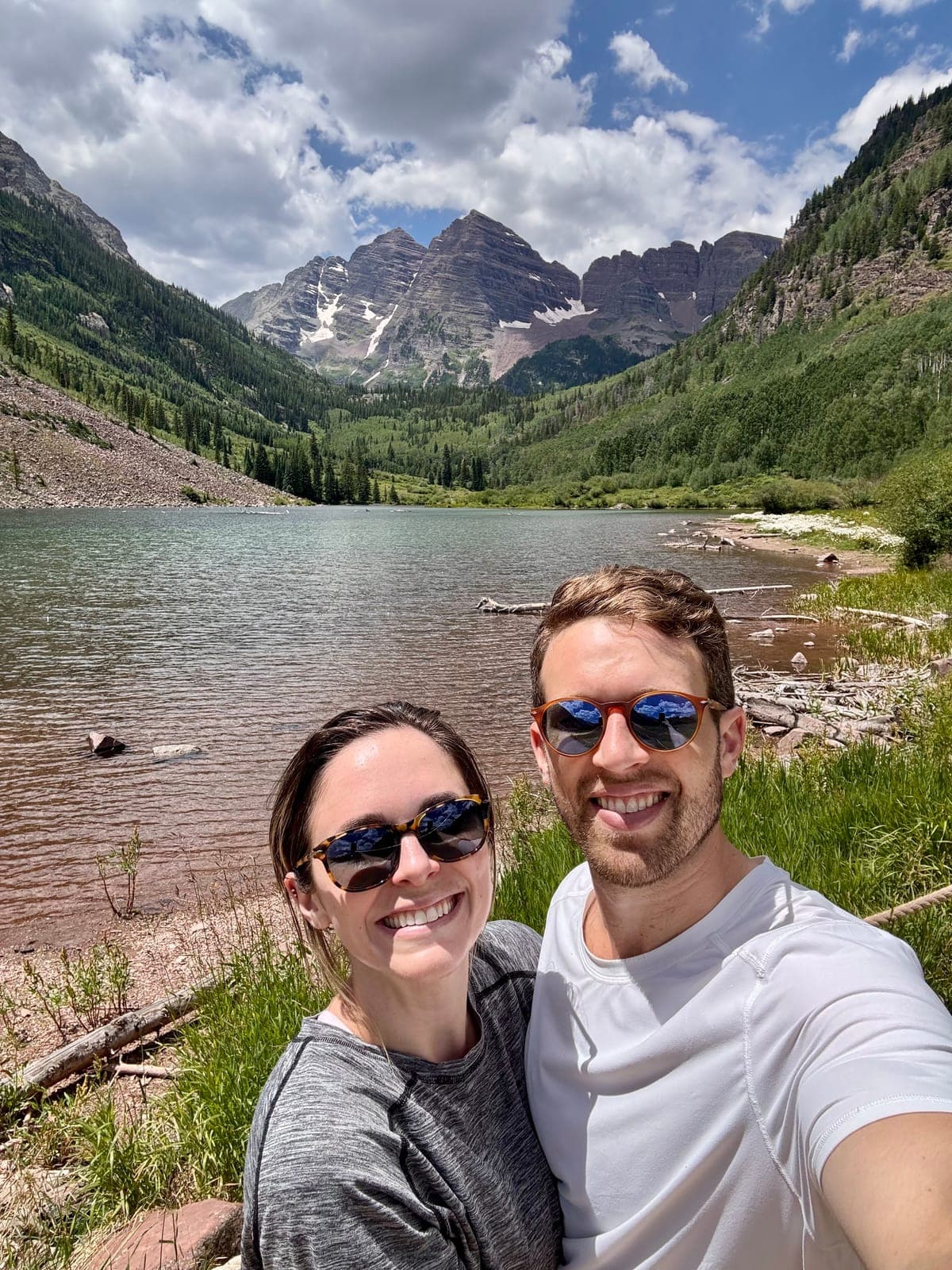 Selfie of Dallas, the founder of NannyFinder, and family at a mountain lake